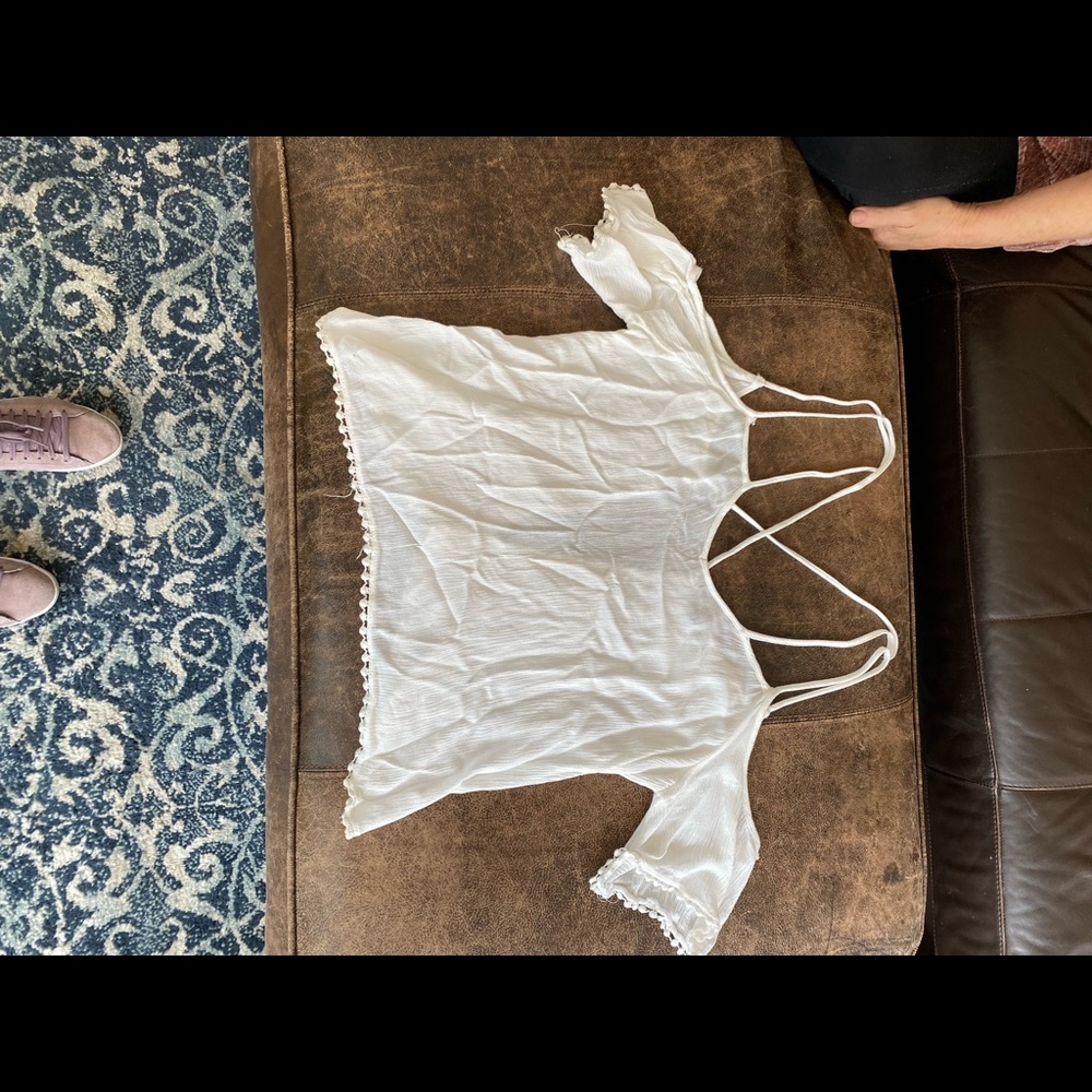 White, spaghetti strap crop top, open back, good condition.